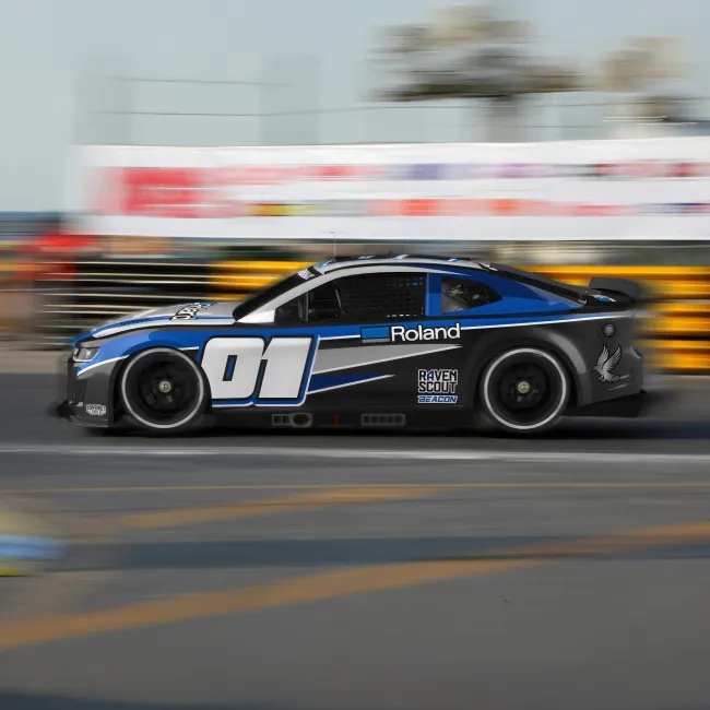 Vehicle wrap application shown by Roland DGA